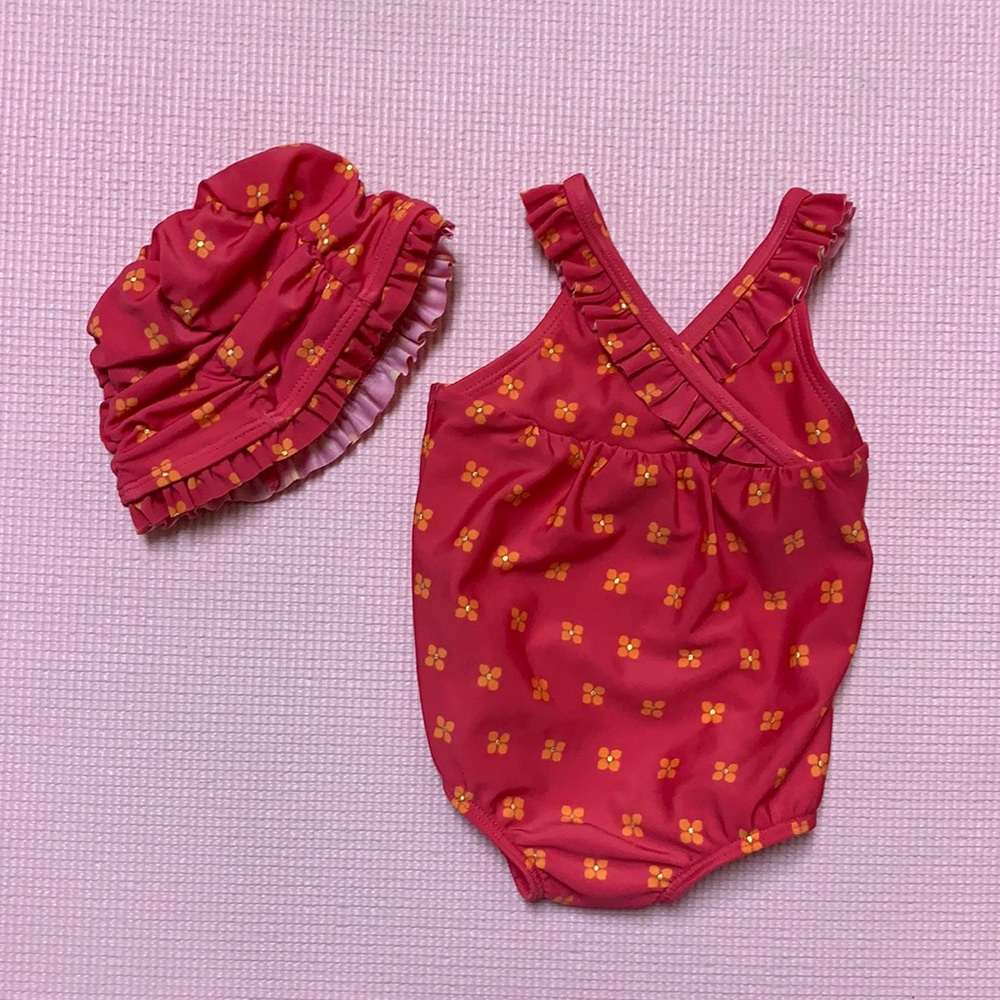 Gymboree one piece swim suit in 6-12 months with swim cap/hat